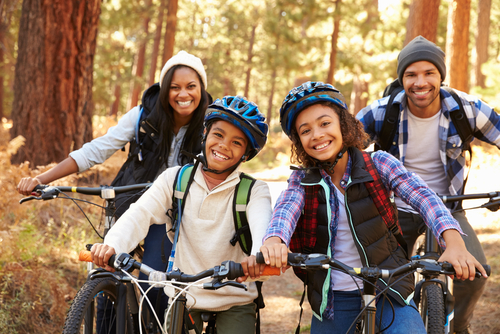 healthy family riding bicycles